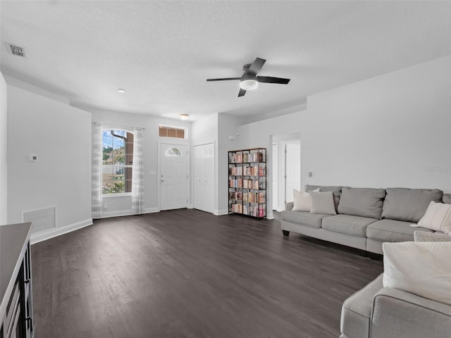 917 Dekleva Dr, Apopka, FL 32712 - living area with dark wood-type flooring, baseboards, and ceiling fan