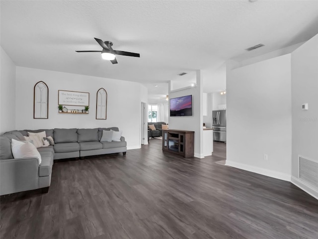 917 Dekleva Dr, Apopka, FL 32712 - living area featuring ceiling fan, dark wood-type flooring, and baseboards