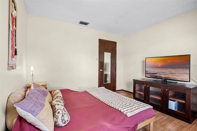281 NE Greenbrier Ave, Port St Lucie, FL 34983 - bedroom featuring wood finished floors