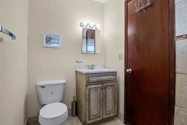 281 NE Greenbrier Ave, Port St Lucie, FL 34983 - half bathroom featuring vanity and tile patterned floors