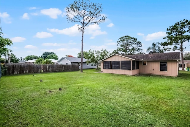 281 NE Greenbrier Ave, Port St Lucie, FL 34983 - view of yard featuring a sunroom