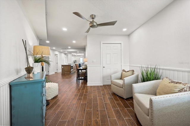 4621 S Atlantic Ave Unit 7202, Port Orange, FL 32127 - living room featuring a ceiling fan, dark wood-style floors, and recessed lighting
