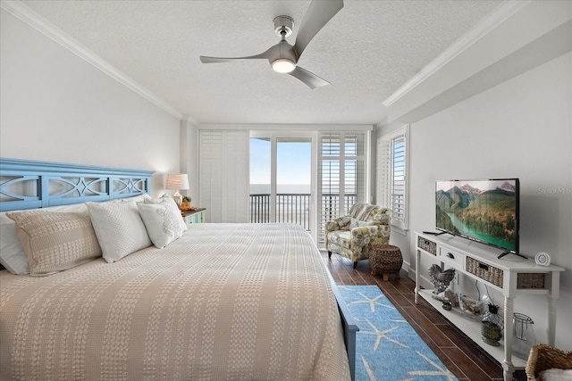 4621 S Atlantic Ave Unit 7202, Port Orange, FL 32127 - bedroom with access to outside, ornamental molding, a textured ceiling, wood finished floors, and ceiling fan
