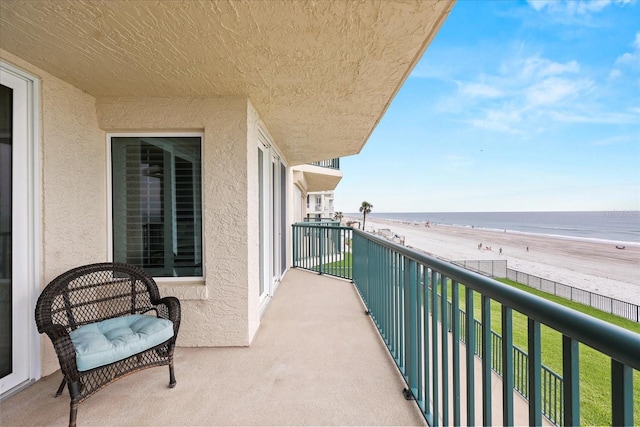 4621 S Atlantic Ave Unit 7202, Port Orange, FL 32127 - balcony featuring view of water and beach