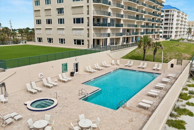 4621 S Atlantic Ave Unit 7202, Port Orange, FL 32127 - community pool featuring a patio area