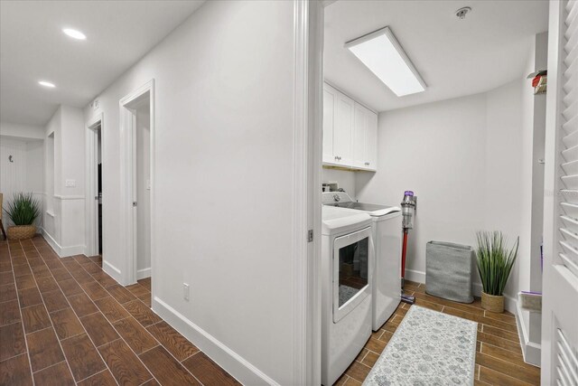4621 S Atlantic Ave Unit 7202, Port Orange, FL 32127 - washroom with washing machine and dryer, cabinet space, recessed lighting, wood tiled floors, and baseboards