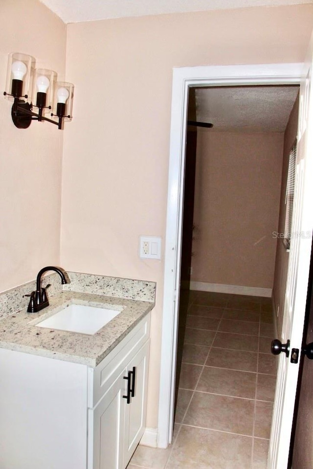425 Walnut St, Daytona Beach, FL 32114 - bathroom with vanity and tile patterned flooring