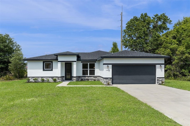 14470 SW 46th Ct, Ocala, FL 34473 - prairie-style house with stucco siding, a garage, stone siding, a front lawn, and concrete driveway