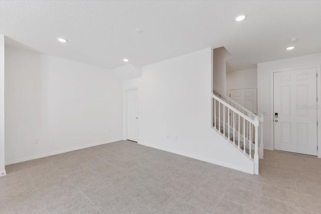 1267 Stockwell Ave, Saint Cloud, FL 34771 - empty room with recessed lighting and stairs