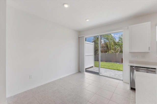 1267 Stockwell Ave, Saint Cloud, FL 34771 - unfurnished living room featuring recessed lighting and light tile patterned flooring