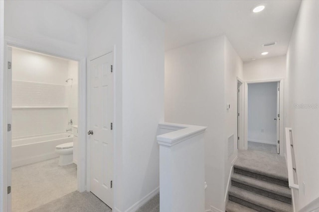 1267 Stockwell Ave, Saint Cloud, FL 34771 - hall featuring recessed lighting, an upstairs landing, and carpet