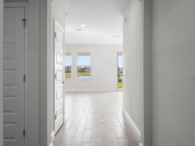11027 Hollow Bay Dr, Winter Garden, FL 34787 - hall with baseboards and recessed lighting