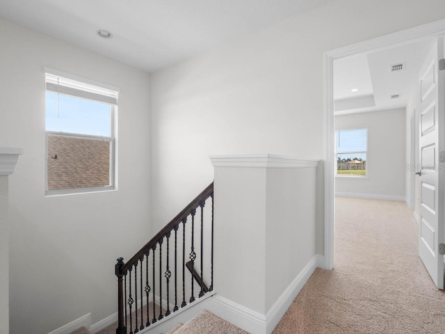 11027 Hollow Bay Dr, Winter Garden, FL 34787 - hallway with an upstairs landing, carpet floors, baseboards, and recessed lighting
