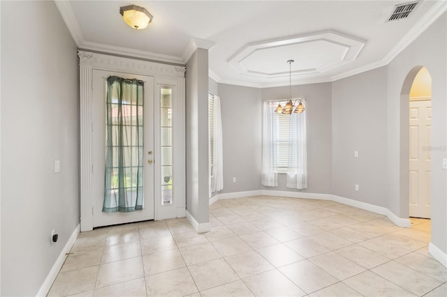 11322 Rapallo Ln, Windermere, FL 34786 - foyer entrance with ornamental molding, arched walkways, light tile patterned floors, and a chandelier