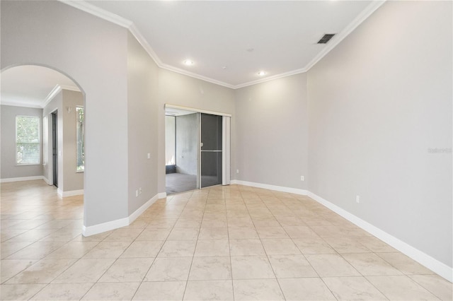 11322 Rapallo Ln, Windermere, FL 34786 - empty room with ornamental molding, arched walkways, light tile patterned flooring, and recessed lighting