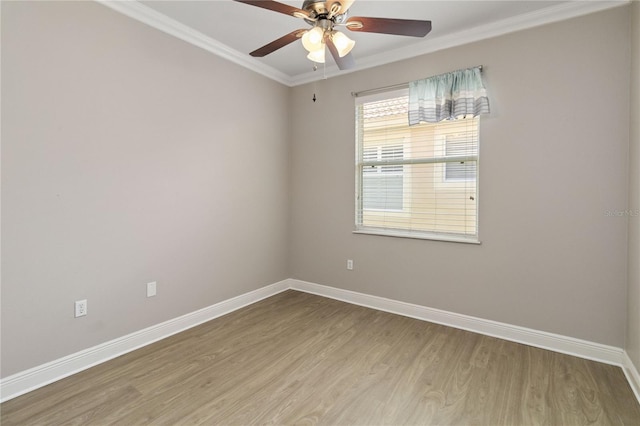 11322 Rapallo Ln, Windermere, FL 34786 - unfurnished room with wood finished floors, crown molding, and a ceiling fan
