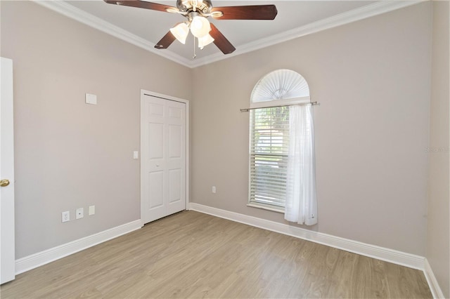 11322 Rapallo Ln, Windermere, FL 34786 - empty room with light wood finished floors, a ceiling fan, and crown molding