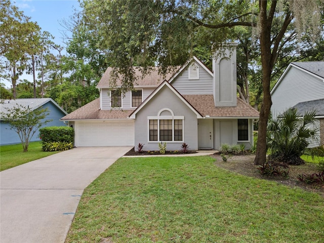 938 Southridge Trl, Altamonte Springs, FL 32714 - traditional-style home featuring roof with shingles, concrete driveway, a front yard, and stucco siding