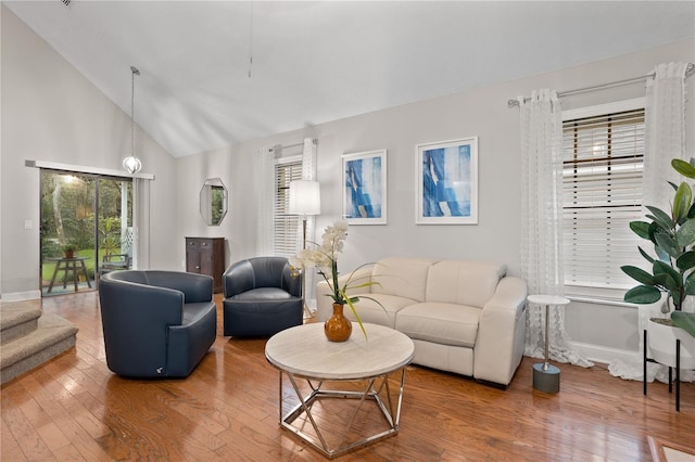 938 Southridge Trl, Altamonte Springs, FL 32714 - living area with hardwood / wood-style floors, baseboards, and high vaulted ceiling