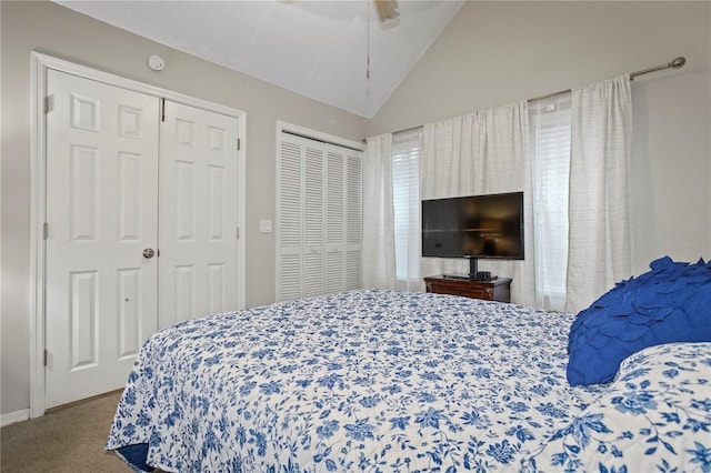 938 Southridge Trl, Altamonte Springs, FL 32714 - bedroom featuring multiple closets, carpet floors, vaulted ceiling, and a ceiling fan