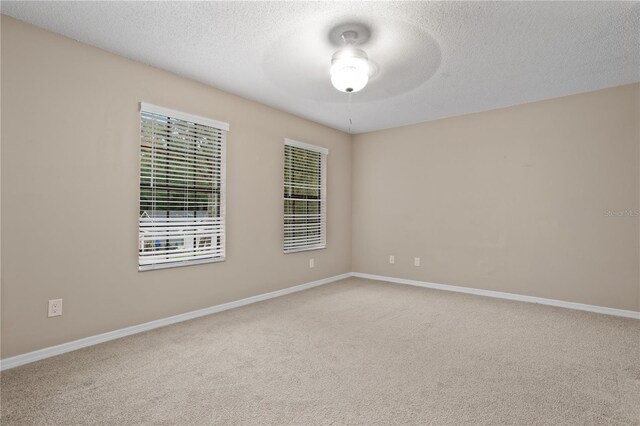 938 Southridge Trl, Altamonte Springs, FL 32714 - carpeted spare room featuring a ceiling fan, a textured ceiling, and baseboards
