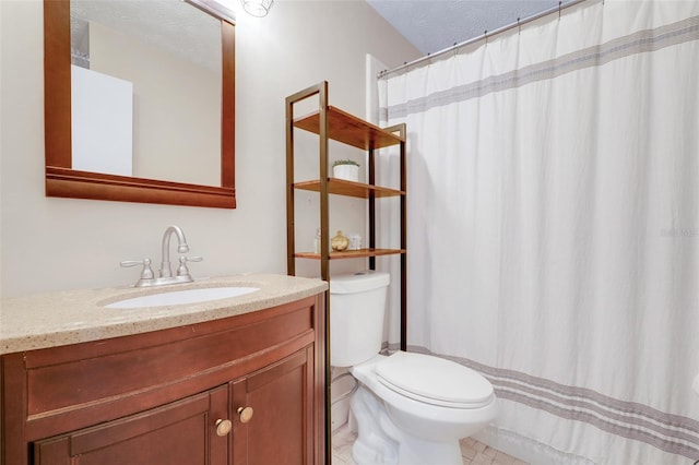 5323 Hansel Ave Unit E14, Orlando, FL 32809 - bathroom with toilet, vanity, a textured ceiling, and a shower with curtain
