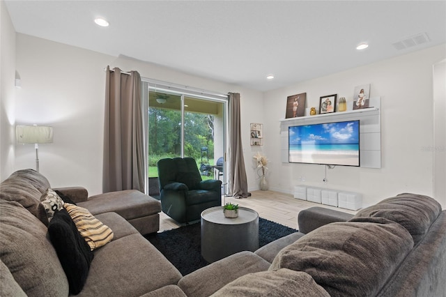 2339 Jernigan Loop, Kissimmee, FL 34746 - living room with wood finished floors, recessed lighting, and baseboards