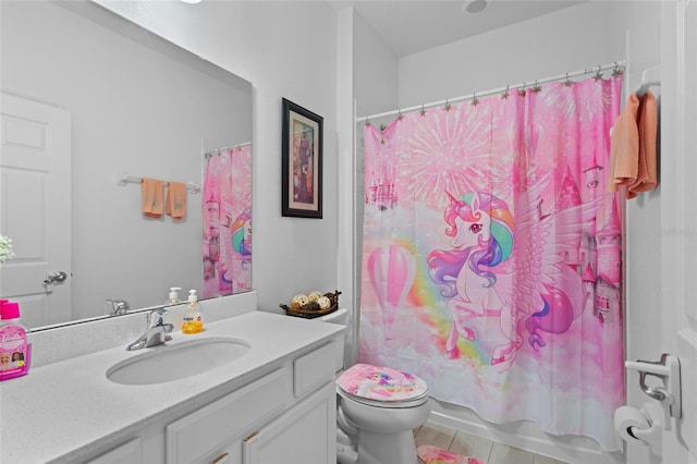 2339 Jernigan Loop, Kissimmee, FL 34746 - bathroom with vanity, toilet, and shower / bath combo with shower curtain