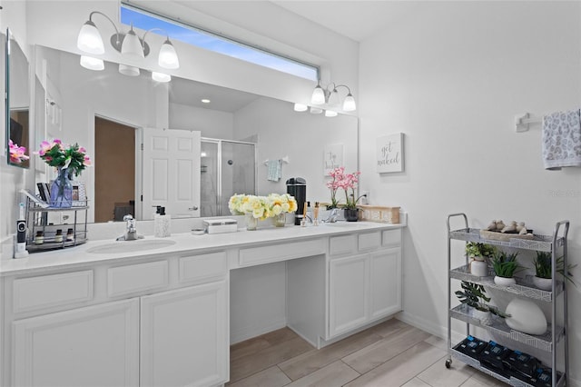 2339 Jernigan Loop, Kissimmee, FL 34746 - bathroom featuring double vanity and a shower stall