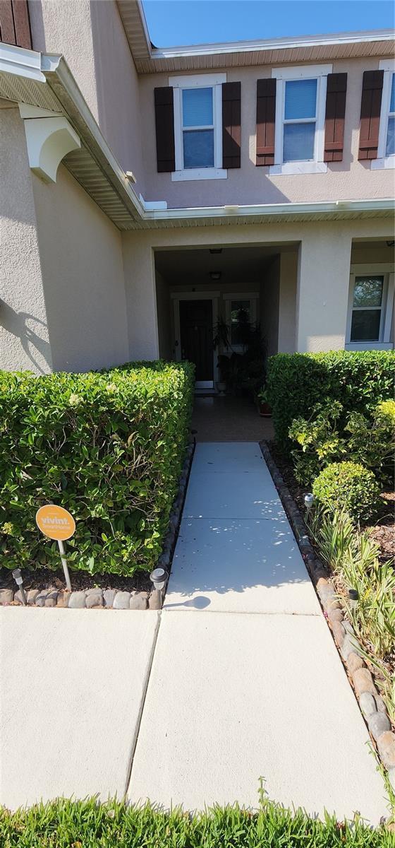 7620 Tangle Rush Dr, Gibsonton, FL 33534 - entrance to property with stucco siding