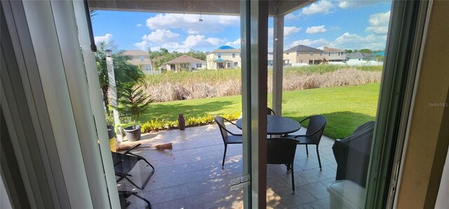 7620 Tangle Rush Dr, Gibsonton, FL 33534 - view of patio / terrace featuring a residential view