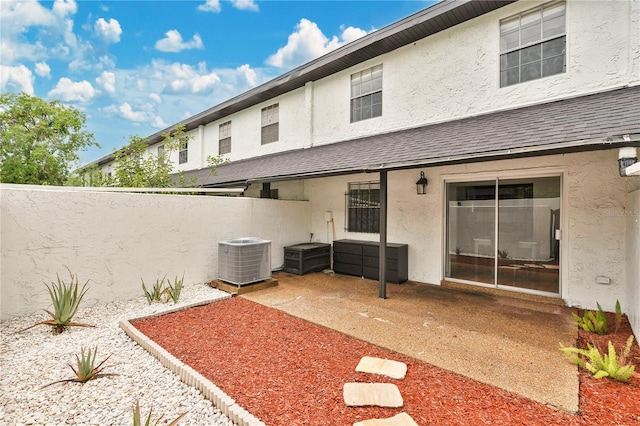 5662 Royal Pine Blvd Unit 24, Orlando, FL 32807 - view of yard featuring central AC unit and a patio