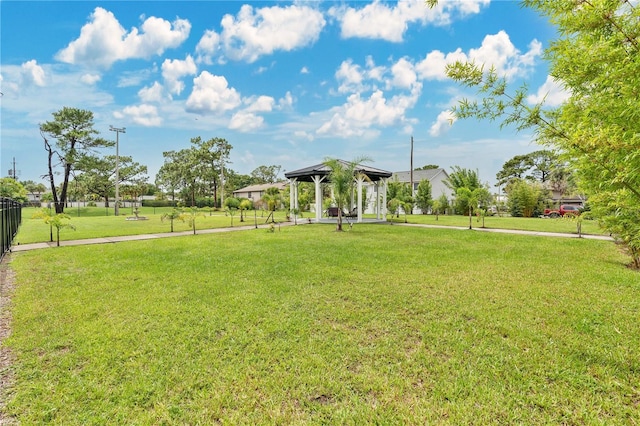 5662 Royal Pine Blvd Unit 24, Orlando, FL 32807 - view of home's community featuring a gazebo and a lawn
