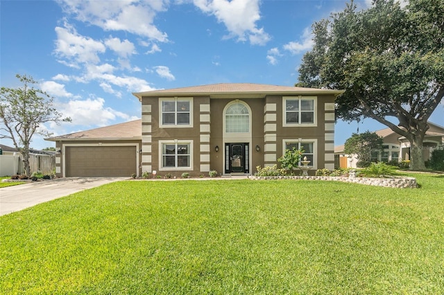 16012 Lanesboro Ct, Clermont, FL 34711 - view of front facade with a front lawn, driveway, a garage, and stucco siding