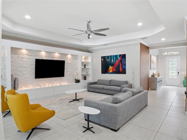 1265 Estancia Woods Loop, Windermere, FL 34786 - living area featuring a raised ceiling, ceiling fan, light tile patterned floors, recessed lighting, and built in shelves