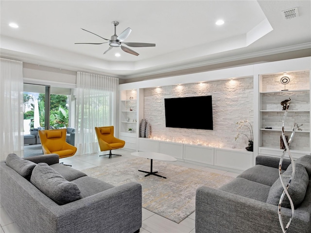 1265 Estancia Woods Loop, Windermere, FL 34786 - living area with a raised ceiling, a ceiling fan, built in features, recessed lighting, and tile patterned floors