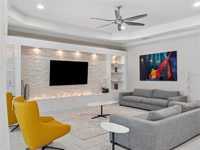 1265 Estancia Woods Loop, Windermere, FL 34786 - living room with a raised ceiling, a ceiling fan, recessed lighting, ornamental molding, and built in shelves