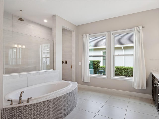 1265 Estancia Woods Loop, Windermere, FL 34786 - full bath with vanity, a bath, tiled shower, tile patterned floors, and recessed lighting