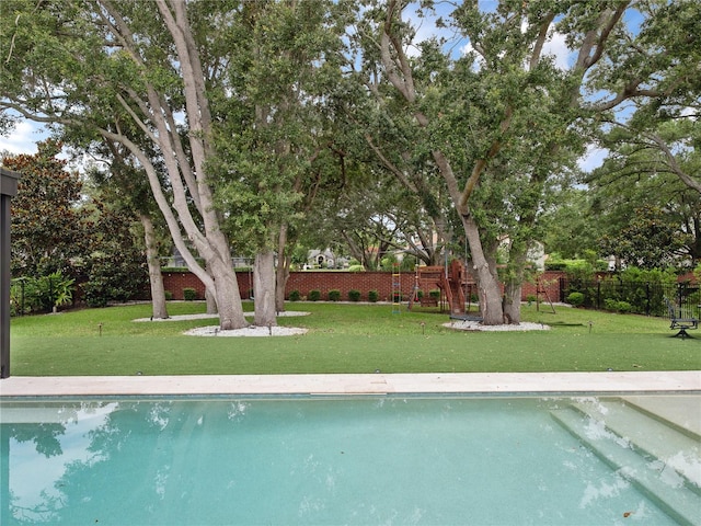 1265 Estancia Woods Loop, Windermere, FL 34786 - view of swimming pool with view of scattered trees