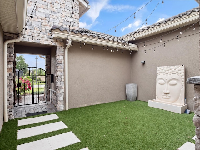 1265 Estancia Woods Loop, Windermere, FL 34786 - view of yard featuring a gate