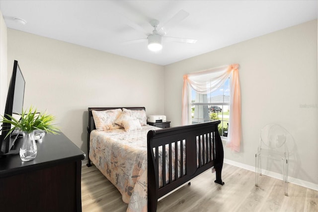 9020 SE 42nd Ct, Ocala, FL 34480 - bedroom with light wood-style flooring and ceiling fan