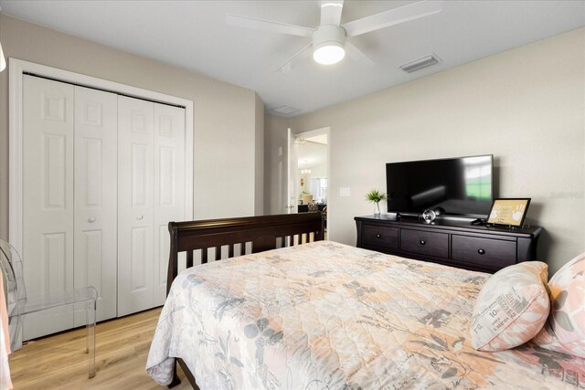9020 SE 42nd Ct, Ocala, FL 34480 - bedroom featuring light wood finished floors, a closet, and ceiling fan