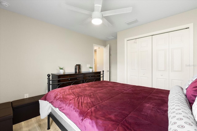 9020 SE 42nd Ct, Ocala, FL 34480 - bedroom featuring wood finished floors, a closet, and ceiling fan