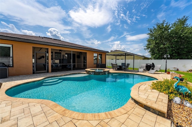 3562 Foxchase Dr, Clermont, FL 34711 - view of pool with a patio area, a fenced backyard, a pool with connected hot tub, a ceiling fan, and a sunroom