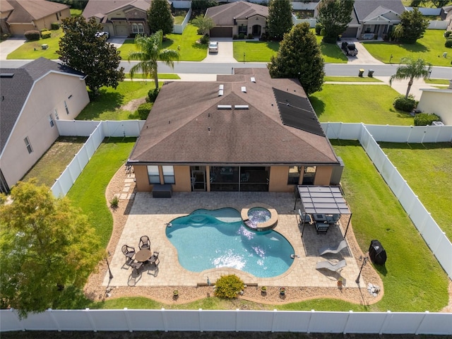 3562 Foxchase Dr, Clermont, FL 34711 - view of swimming pool with a residential view, a pool with connected hot tub, a fenced backyard, and a patio