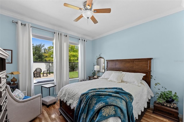 3562 Foxchase Dr, Clermont, FL 34711 - bedroom featuring wood finished floors, ornamental molding, and ceiling fan