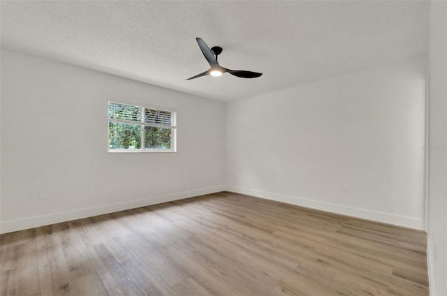 324 James Pl, Saint Cloud, FL 34769 - spare room featuring light wood finished floors, baseboards, and a ceiling fan