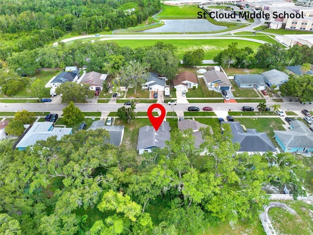 324 James Pl, Saint Cloud, FL 34769 - aerial overview of property's location with a large body of water and nearby suburban area