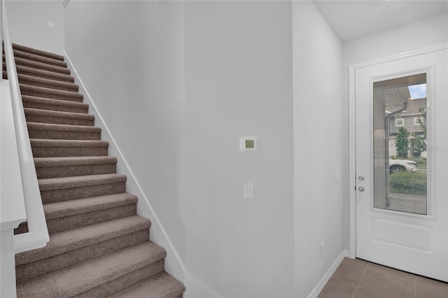 1932 Terrapin Rd, Ocoee, FL 34761 - stairs with tile patterned flooring and baseboards