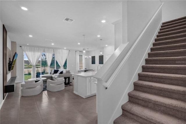 1932 Terrapin Rd, Ocoee, FL 34761 - stairs with recessed lighting and tile patterned flooring